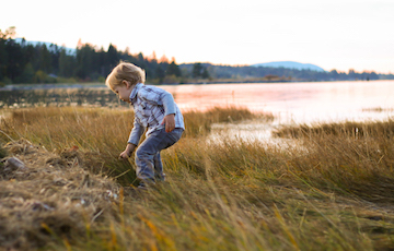 Child playing on a beach