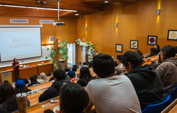 transformative conference showing speaker and youth in attendance